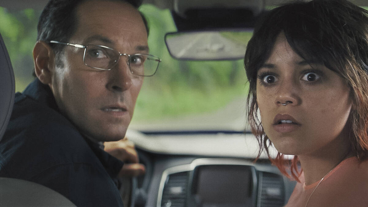 This image released by A24 shows Paul Rudd, left, and Jenna Ortega in a scene from "Death ...