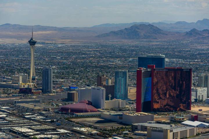 The Goodyear blimp cruises past the North Strip area, the craft in town to provide aerial cover ...
