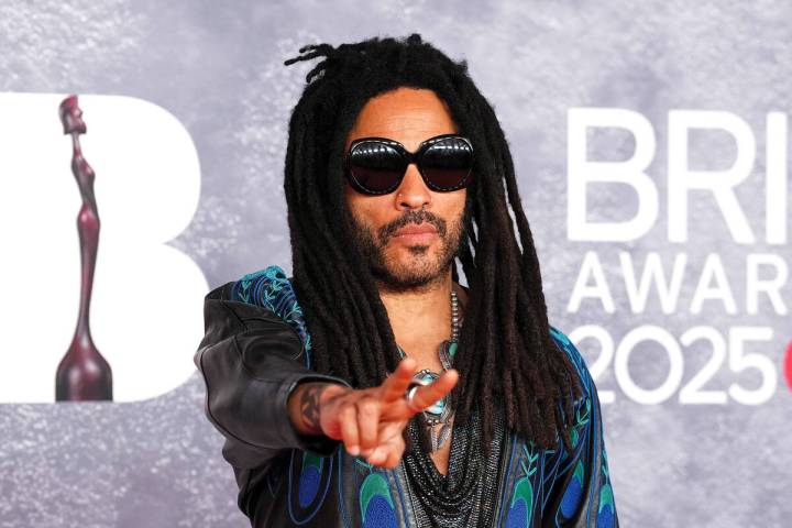 Lenny Kravitz poses for photographers upon arrival at the Brit Awards 2025 in London, Saturday, ...