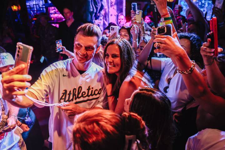 Backstreet Boys member Nick Carter takes selfies with fans during the Backstreet Boys’ s ...