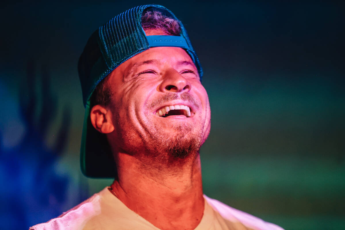 Brian Littrell laughs during the Backstreet Boys’ shrunken head ceremony at Golden Tiki ...
