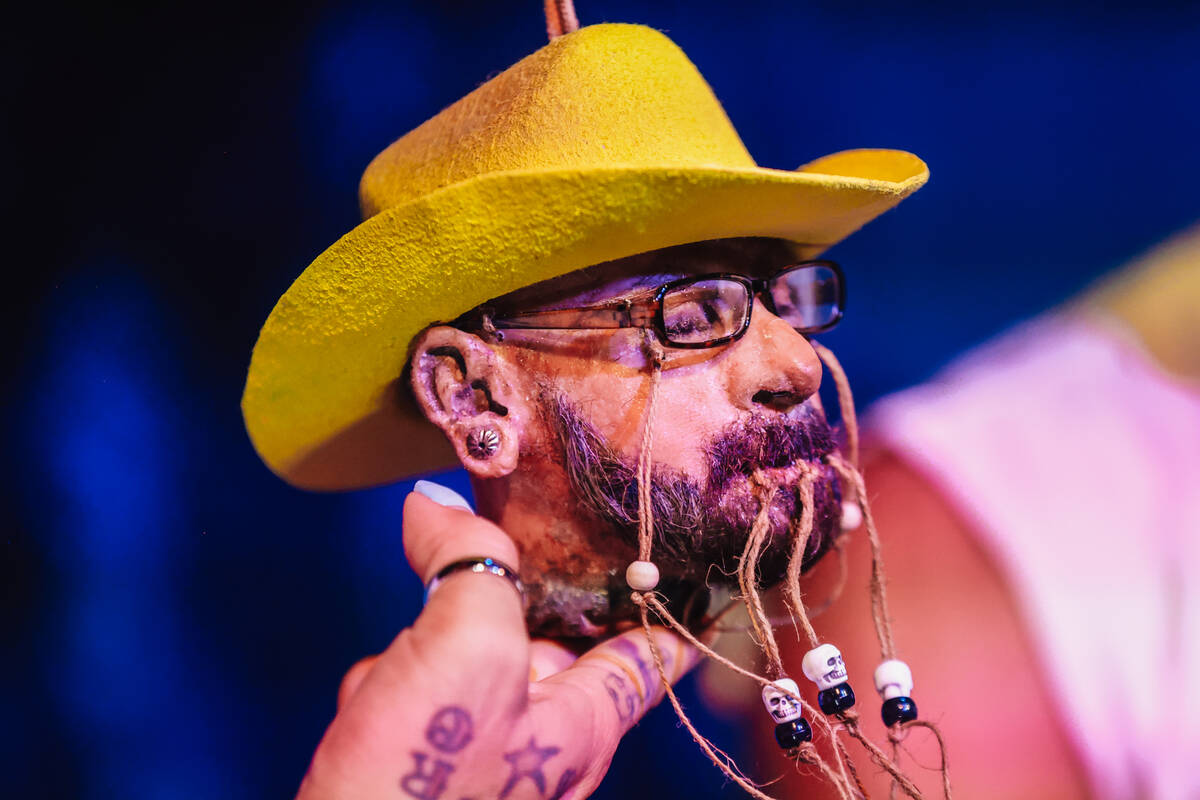A shrunken head version of AJ McLean is held up during the Backstreet Boys’ shrunken hea ...