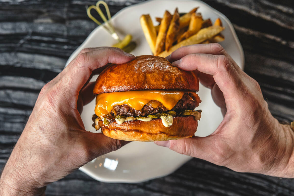 Hamburger avec frites is $15 with the purchase of any cocktail, wine or beer at the bar 9-11 p. ...