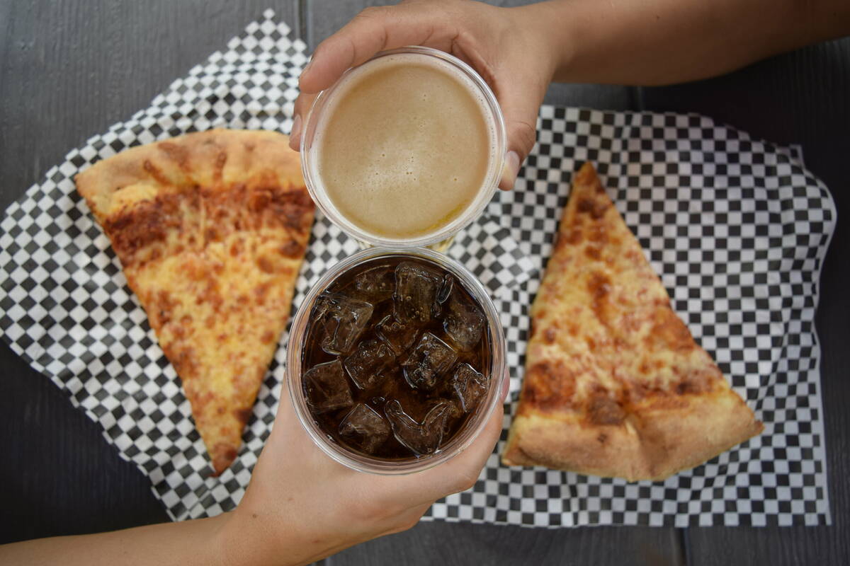 A cheese slice and beer for $8 is an all-day special at Evel Pie. (Evel Pie)