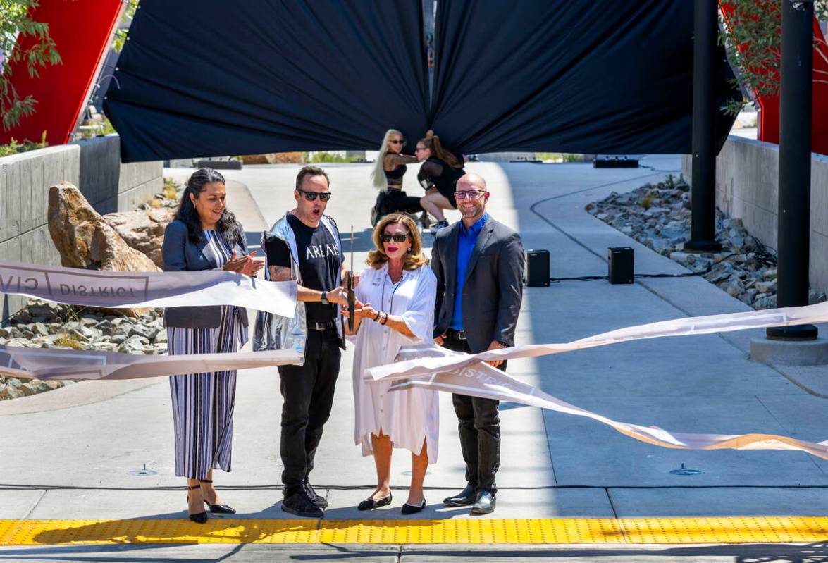 Ward 3 Councilwoman Olivia Díaz, Winston Fisher, AREA15’s chief executive officer, ...