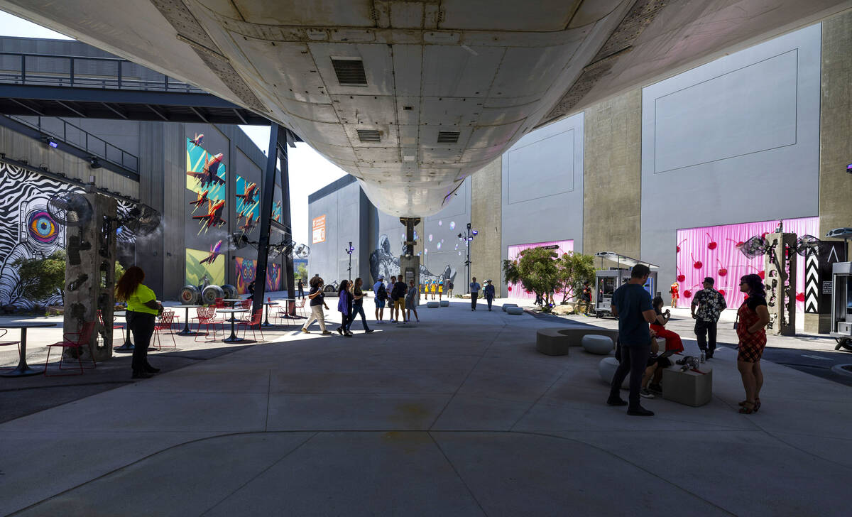 Invited guests wander inside about the new installations including the the world-famous Boeing ...
