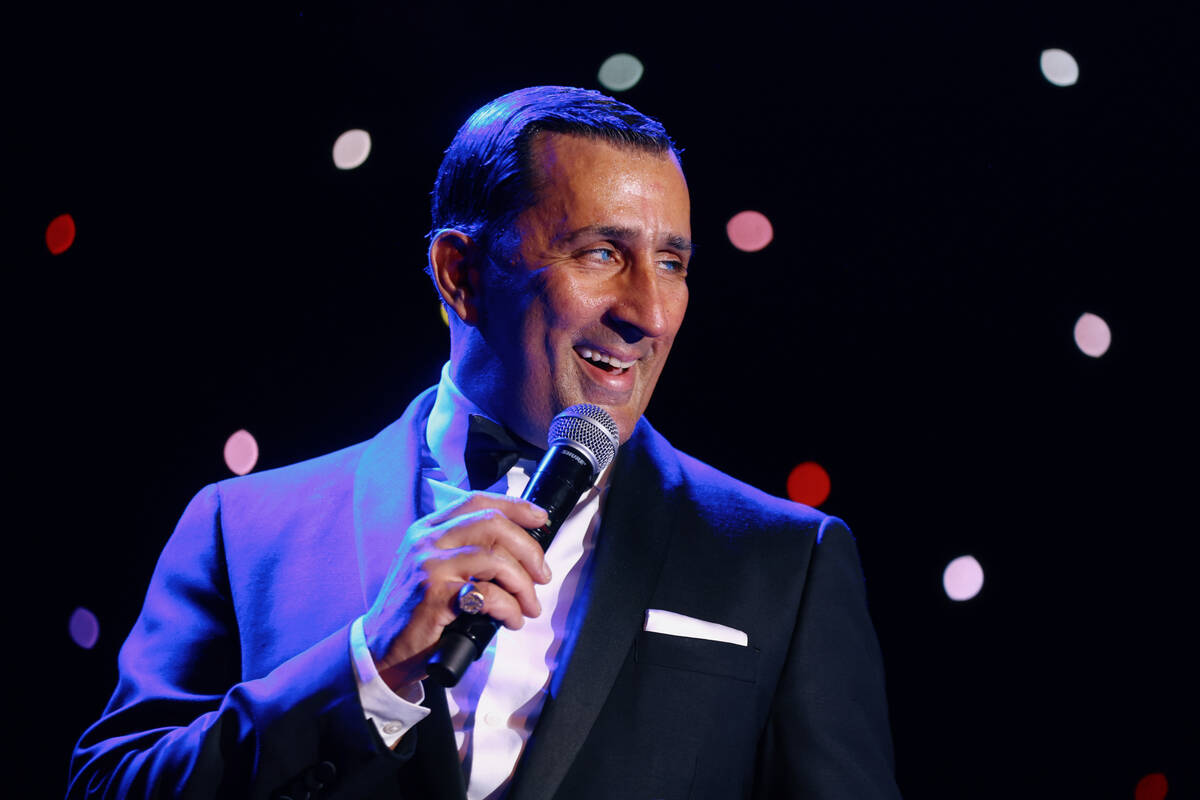 Chris Jason sings as Frank Sinatra during The Rat Pack is Back’s 25th anniversary show a ...