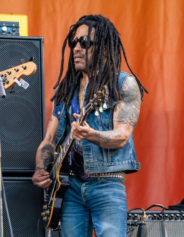 Lenny Kravitz joins Trombone Shorty on stage during the second weekend of the New Orleans Jazz ...