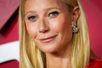 Gwyneth Paltrow poses for photographers upon arrival at the British Fashion Awards on Monday, D ...