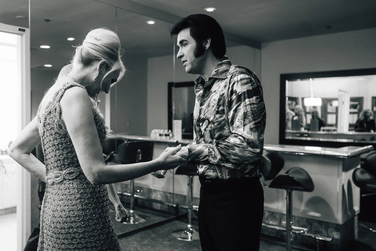 Travis Powell, an Elvis tribute artist, greets friends before perfuming in “1969 Live Co ...