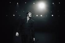 Travis Powell, an Elvis tribute artist, performs during “1969 Live Concert: The King Ret ...
