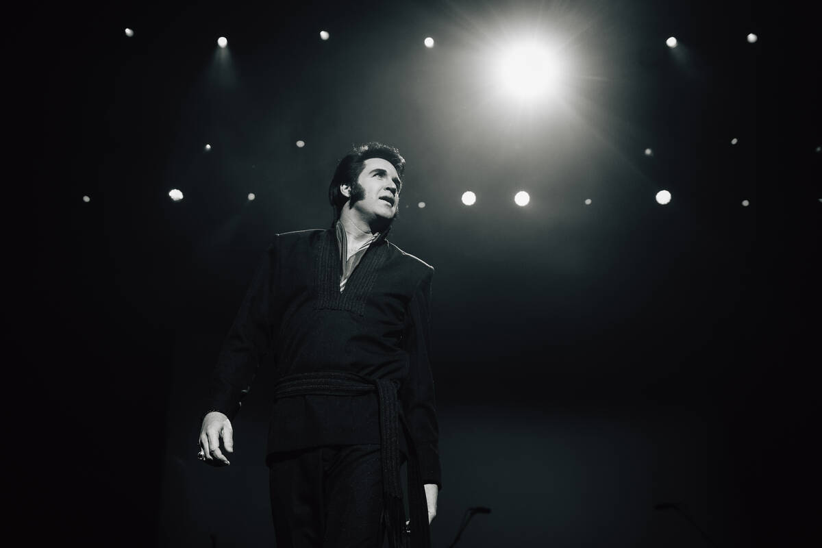 Travis Powell, an Elvis tribute artist, performs during “1969 Live Concert: The King Ret ...