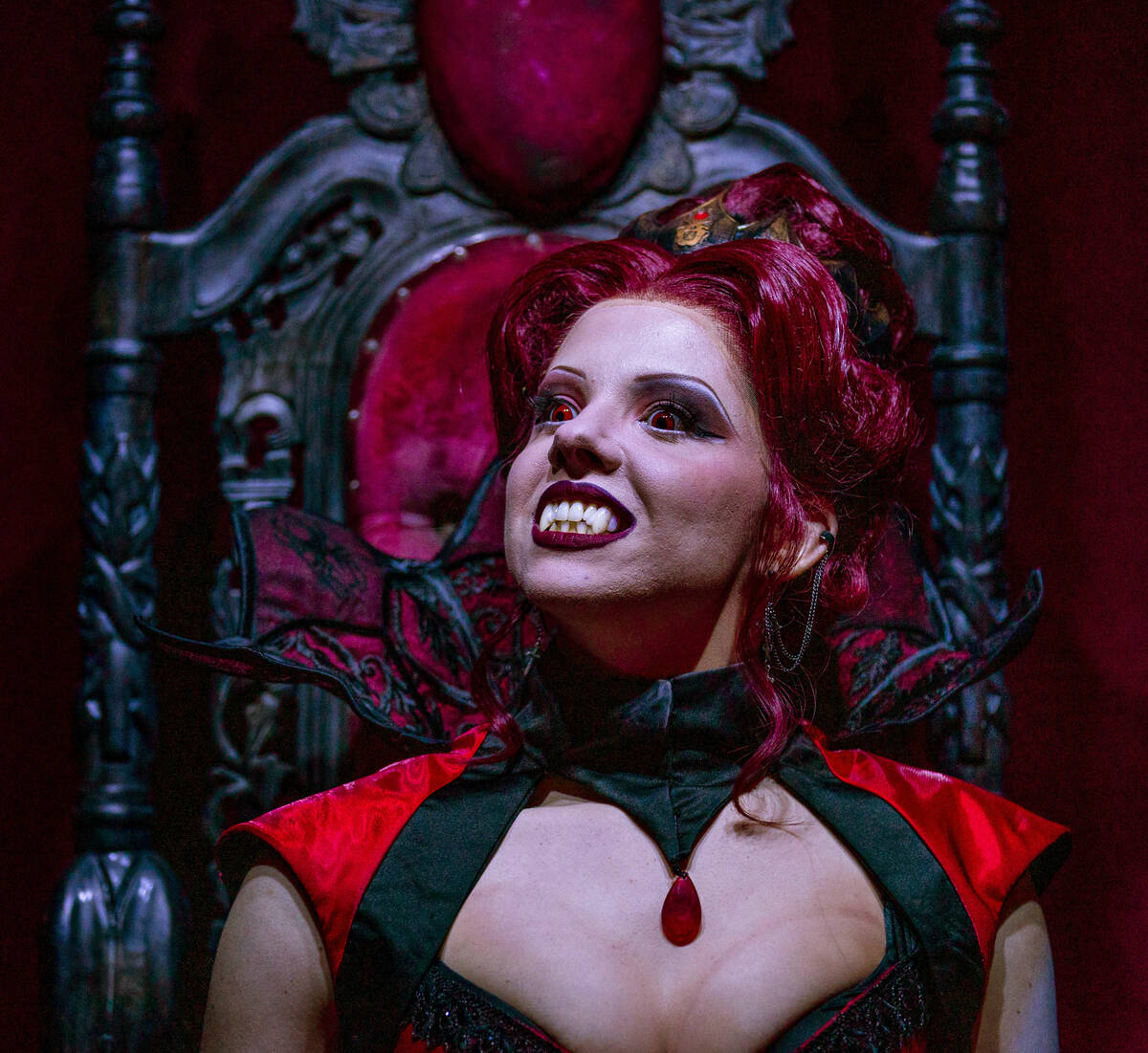 A mistress of the dark sits on her throne within the Dead Storage area during a first look tour ...