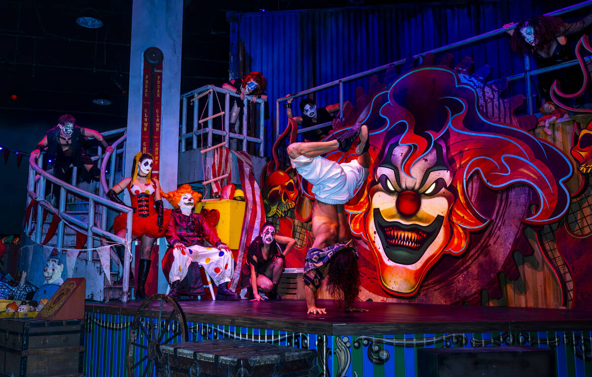 An acrobat performs for his life for Jack the Clown and his ring-mistress Chance along with oth ...
