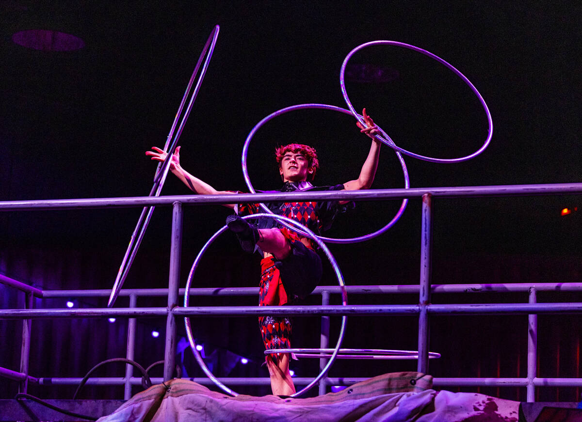 An acrobat performs for his life for Jack the Clown and his ring-mistress Chance along with oth ...