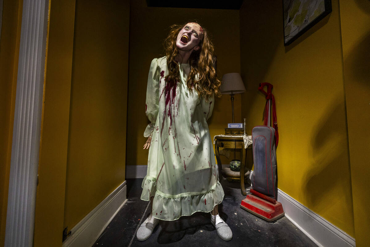 A possessed girl screams in a scene from Blumhouse's The Exorcist: Believer, one of four haunte ...