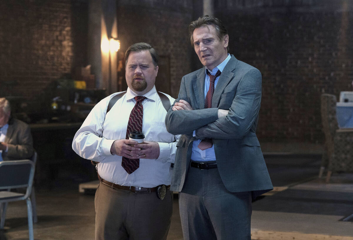 This image released by Paramount Pictures shows Paul Walter Hauser, left, and Liam Neeson in a ...