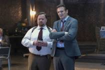 This image released by Paramount Pictures shows Paul Walter Hauser, left, and Liam Neeson in a ...