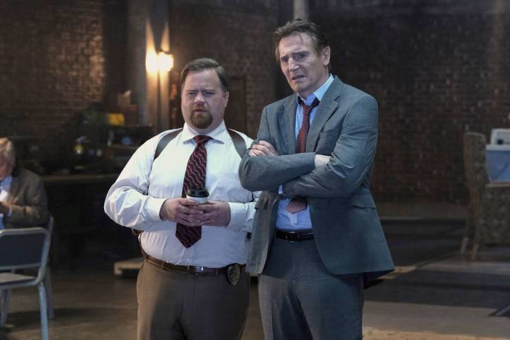 This image released by Paramount Pictures shows Paul Walter Hauser, left, and Liam Neeson in a ...