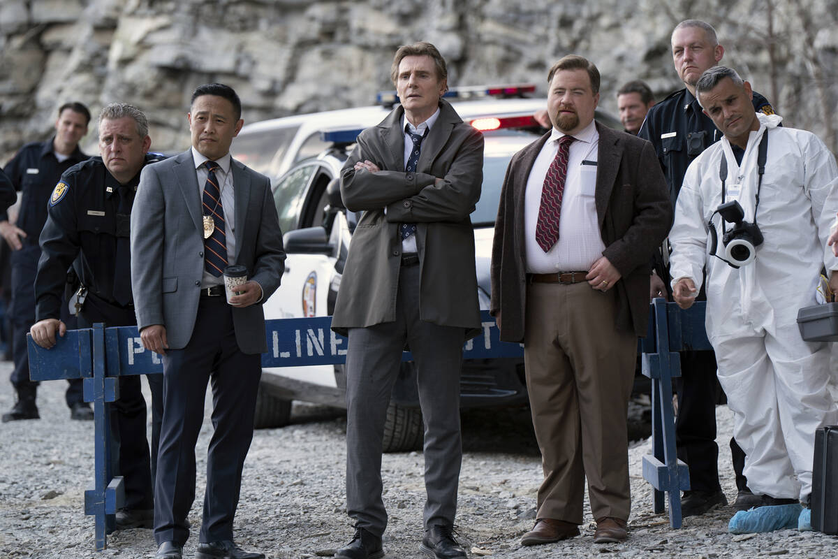 This image released by Paramount Pictures shows, foreground from left, Eddie Yu, Liam Neeson an ...