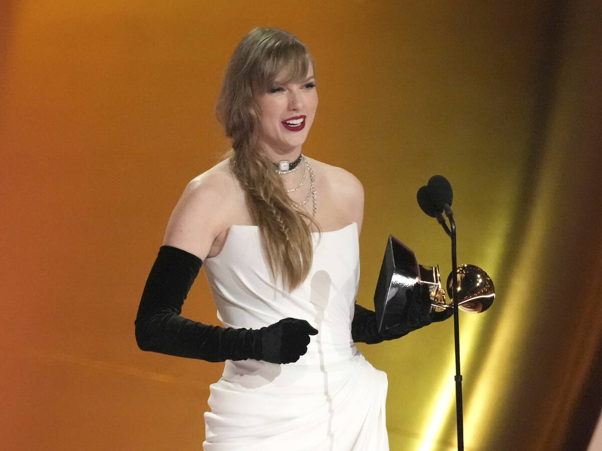 Taylor Swift accepts the award for best pop vocal album for "Midnights" during the 66th annual ...