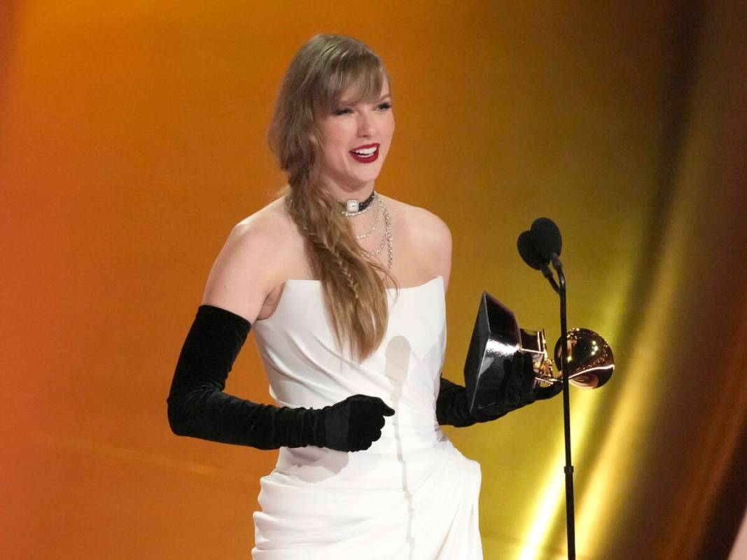 Taylor Swift accepts the award for best pop vocal album for "Midnights" during the 66th annual ...