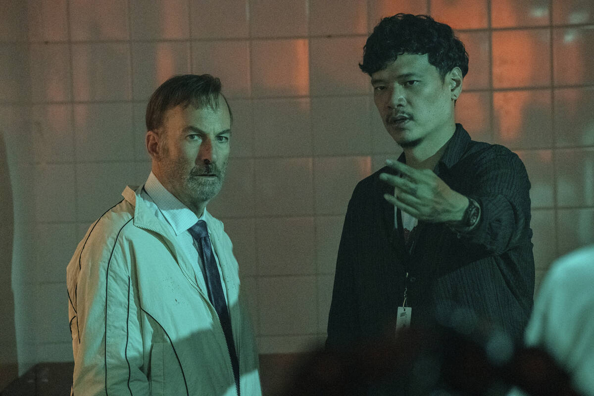 This image released by Universal Pictures shows actor Bob Odenkirk, left, and director Timo Tja ...