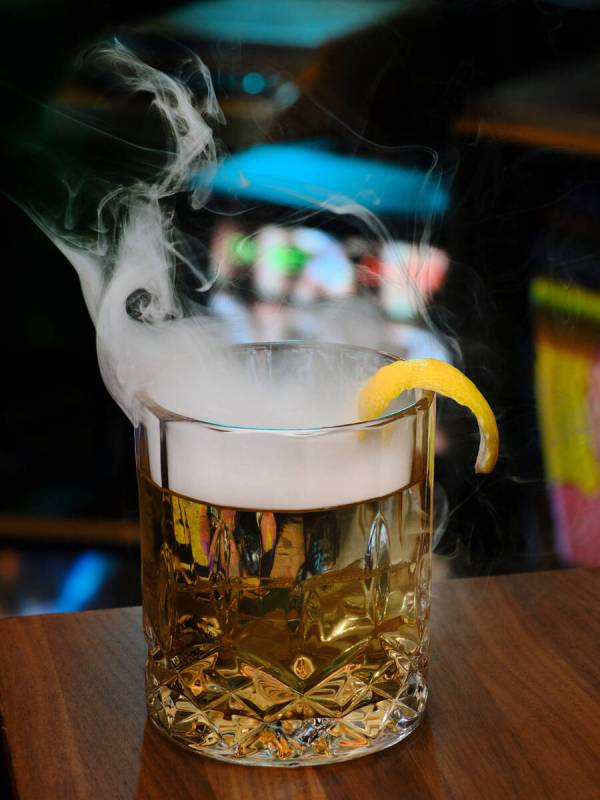 A Wagyu Smoked Old Fashioned from Pachi-Pachi, a cocktail bar and listening lounge opening Aug. ...