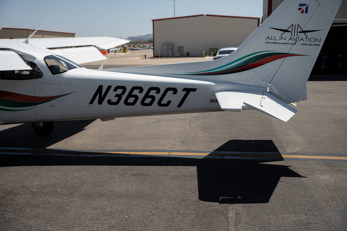 A Cessna 172 aircraft sits near All In Aviation’s hangars, a leading flight school and a ...