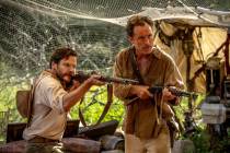 Daniel Bruhl and Jude Law in a scene from "Eden." (Vertical)