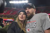 FILE - Kansas City Chiefs tight end Travis Kelce, right, appears with singer Taylor Swift after ...