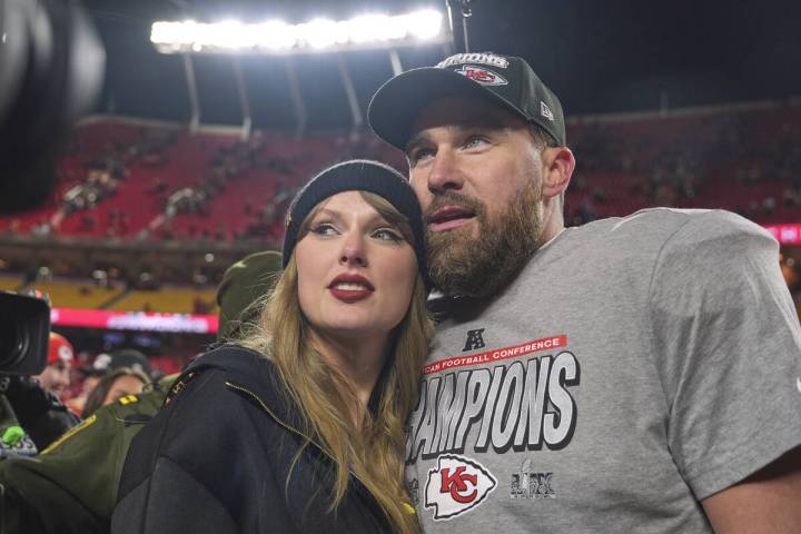FILE - Kansas City Chiefs tight end Travis Kelce, right, appears with singer Taylor Swift after ...