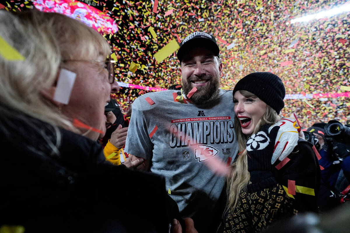 FILE - Donna Kelce stands with her son Kansas City Chiefs tight end Travis Kelce and Taylor Swi ...
