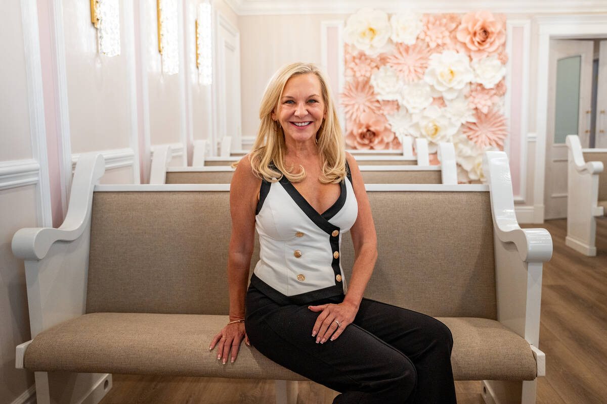 Dee Dee Duffy, owner of the Storybook Wedding Chapel, sits inside the Las Vegas venue Aug. 18, ...