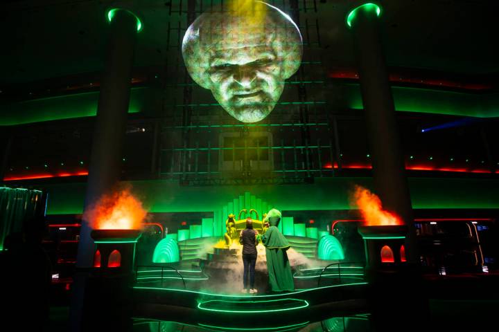 A performer brings a member of the audience to the stage during a rehearsal of the atrium pre-s ...