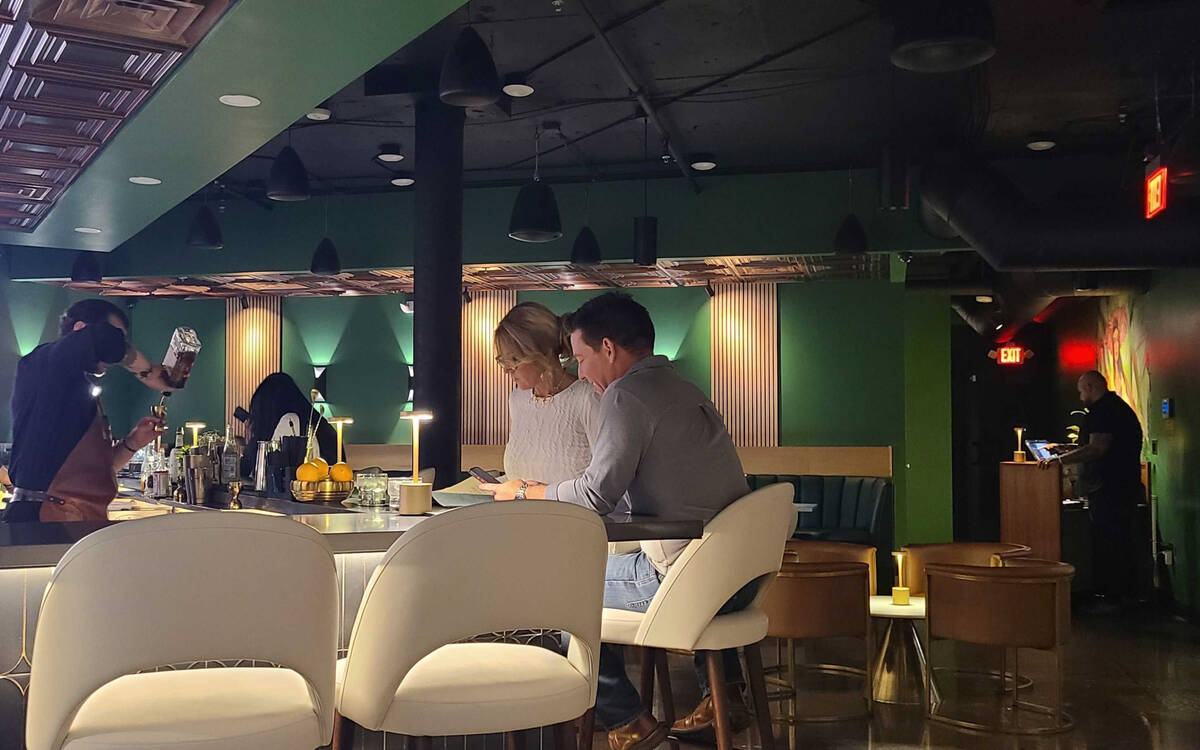 The lounge at CC Speakeasy, which lies hidden behind Craft Creamery ice cream shop in downtown ...