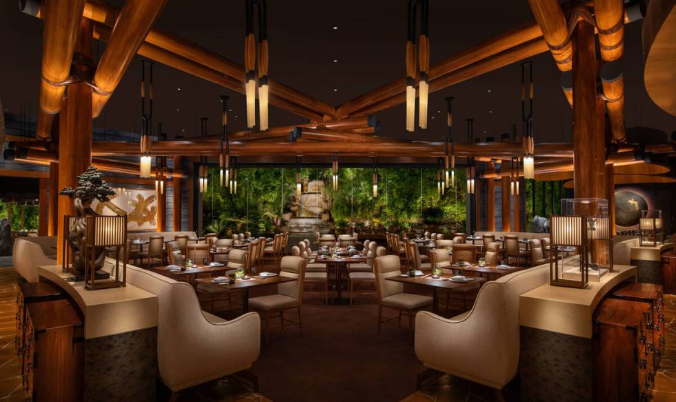 At Wynn Las Vegas, a path leads to the private Floating Pagoda Table set beside lush landscapin ...