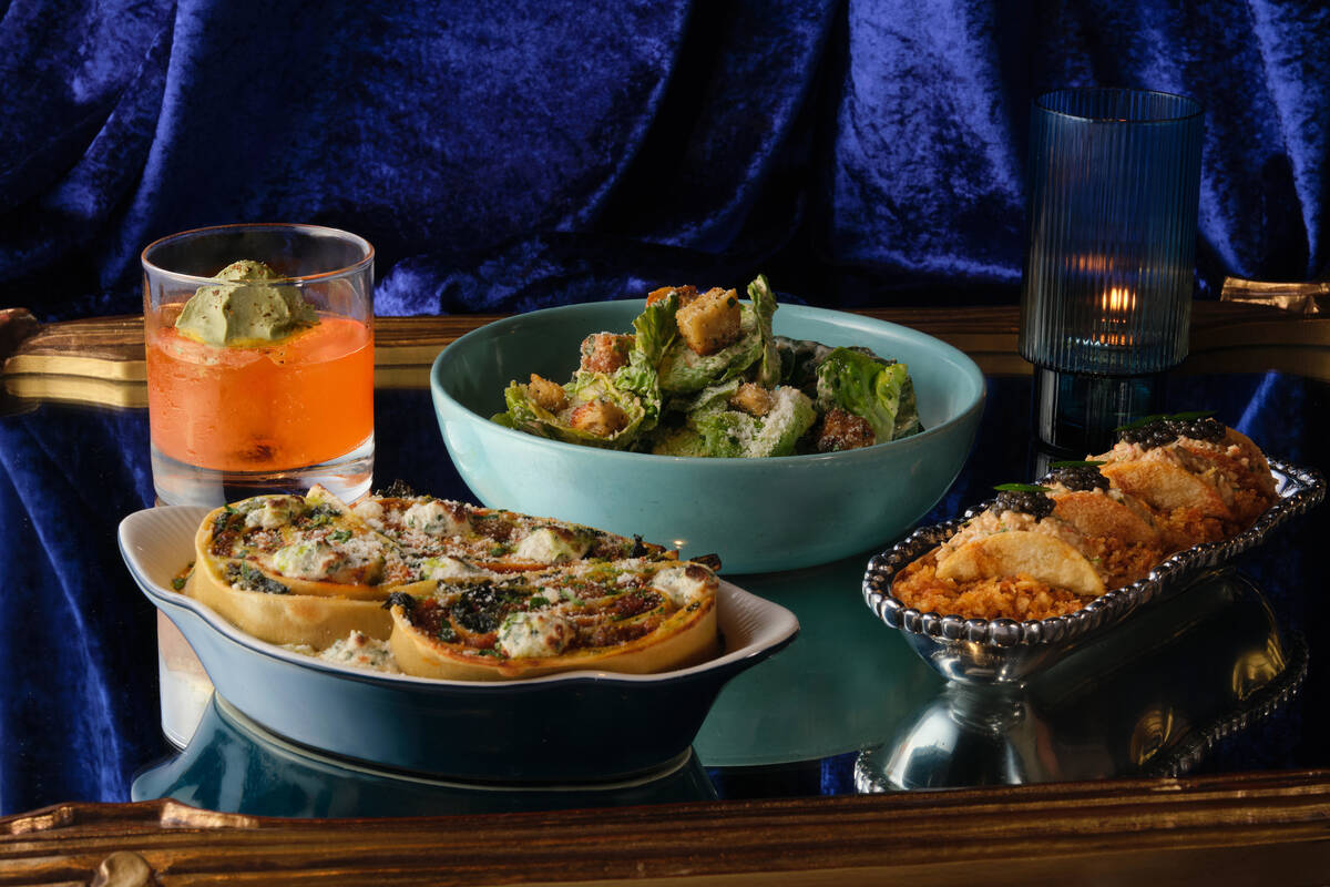 Items on the menu at The Party at Superfrico, which combines dinner with live performances, in ...
