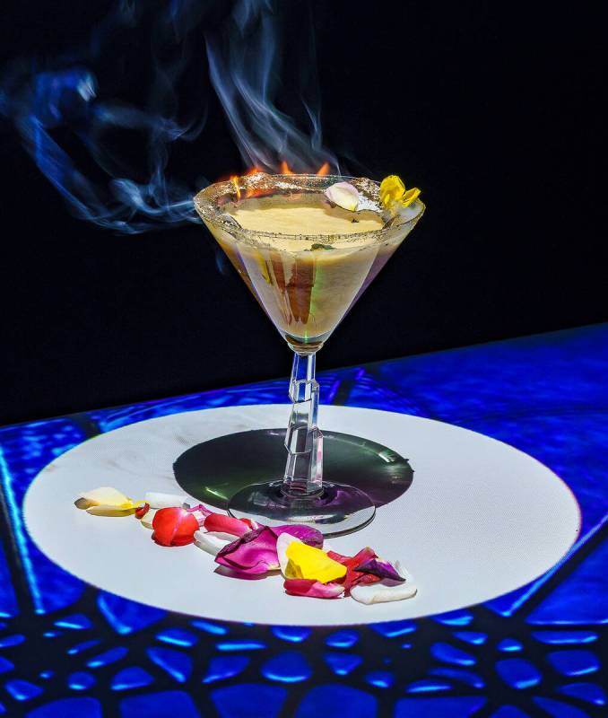 A Down the Rabbit Hole cocktail from the Teatime in Wonderland experience, inspired by "Al ...