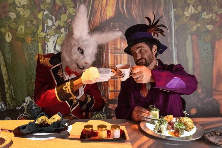 The White Rabbit and the Mad Hatter help lead the Teatime in Wonderland experience, inspired by ...