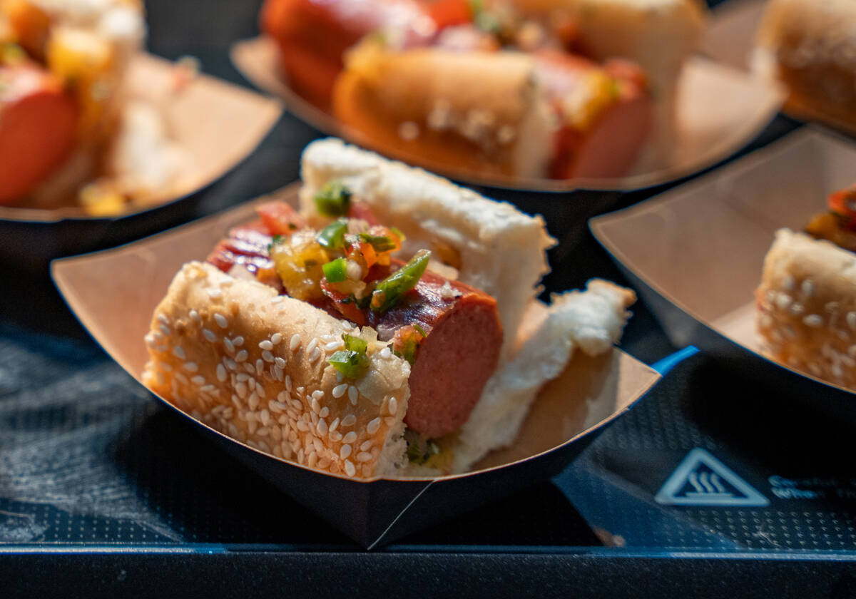 An al pastor sausage is seen at Allegiant Stadium in Las Vegas Sept. 9, 2025. (Kara Gildea/Las ...