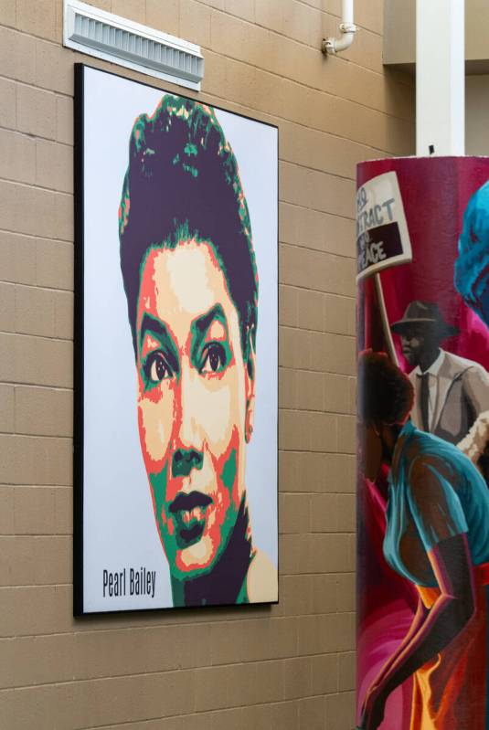 Murals depicting the history of the Historic Westside are painted on the pillars of the Pearson ...
