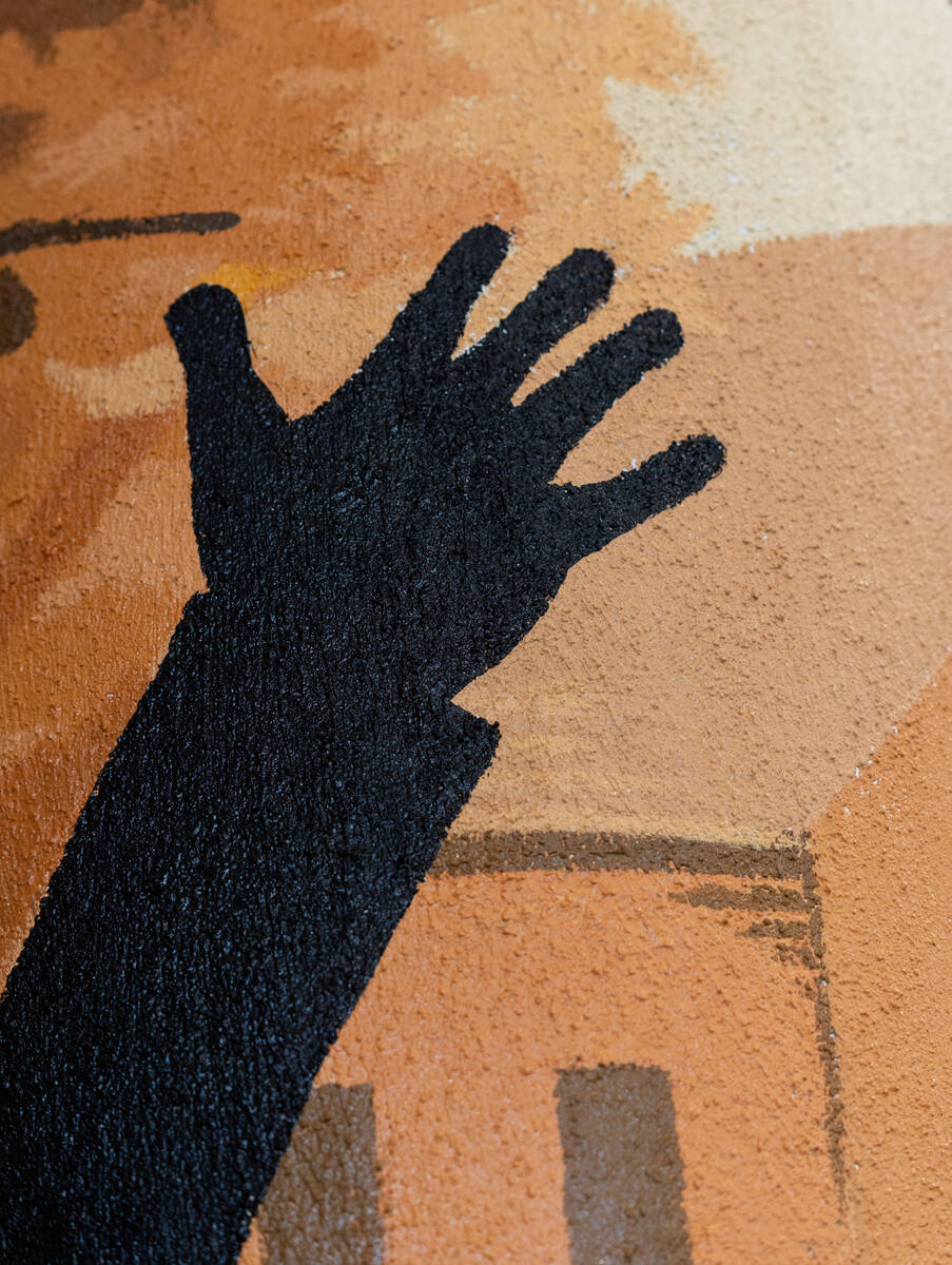 Murals depicting the history of the Historic Westside are painted on the pillars of the Pearson ...