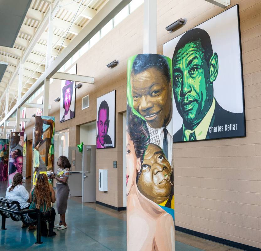 Murals depicting the history of the Historic Westside are painted on the pillars of the Pearson ...