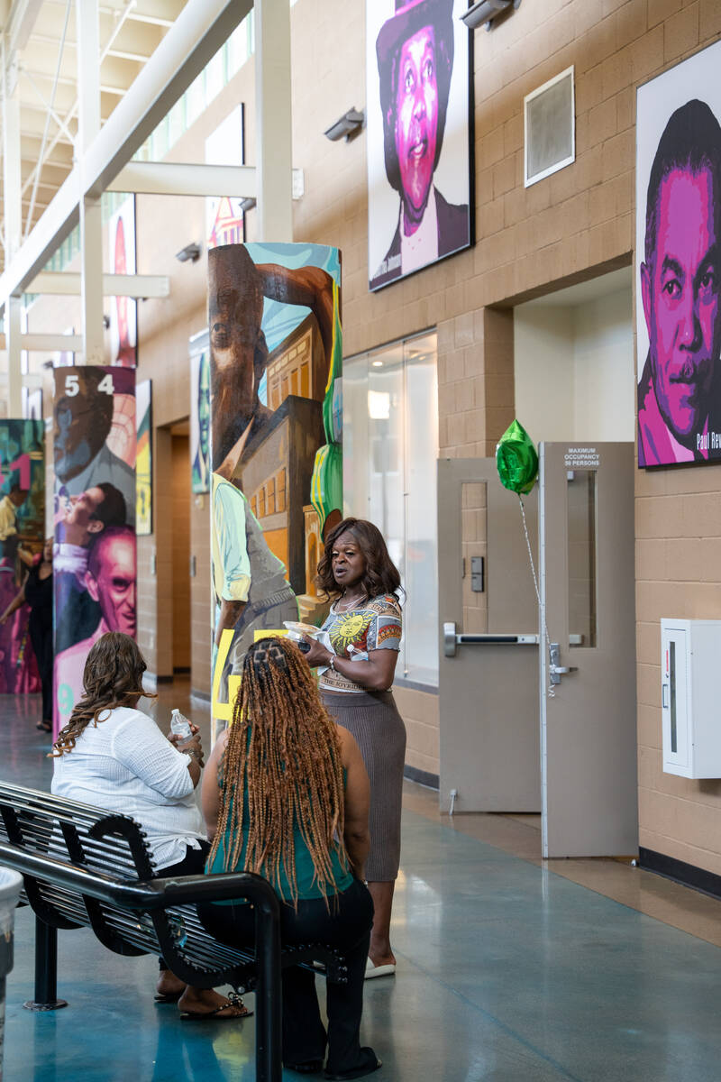 Murals depicting the history of the Historic Westside are painted on the pillars of the Pearson ...