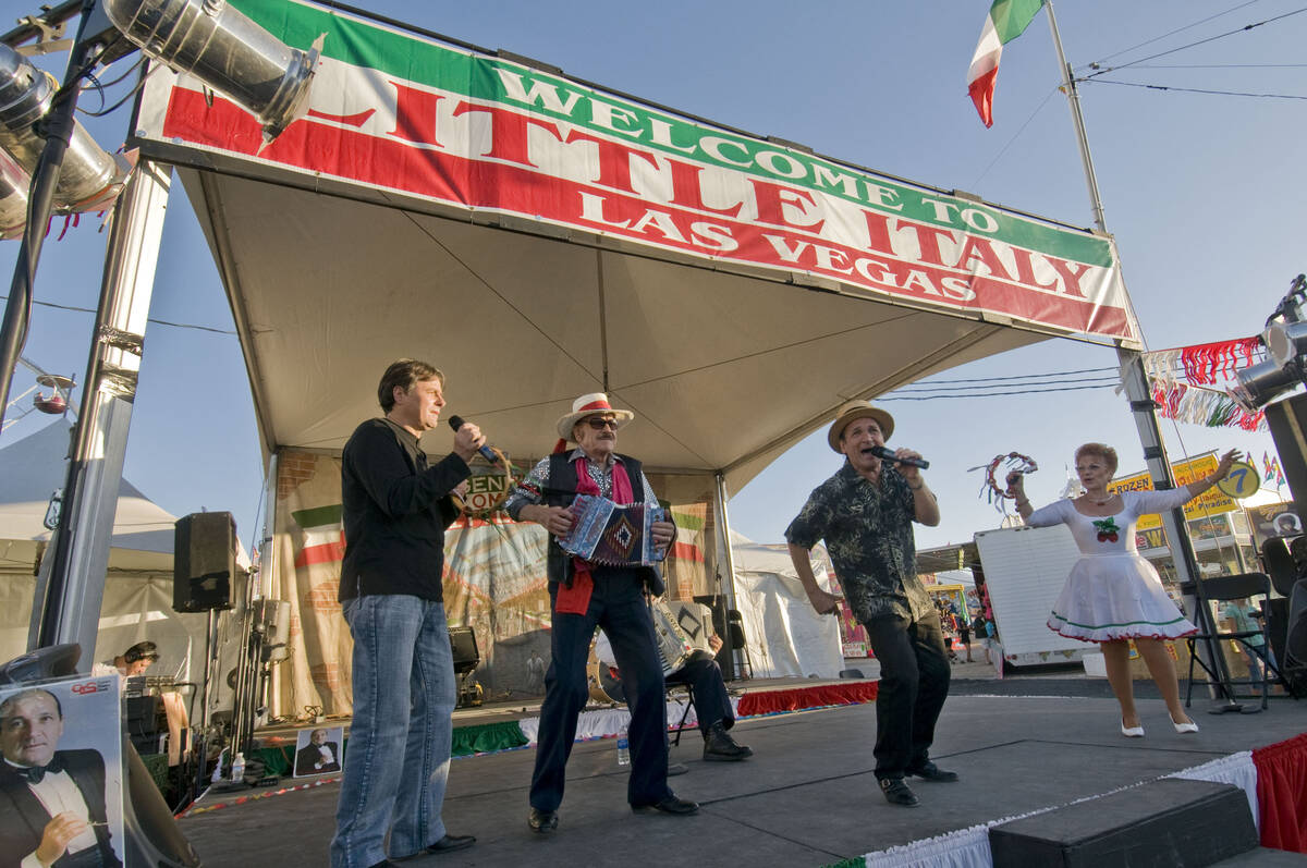 Singer Ciro Giorgio, with a microphone, leads the Ciro Giorgio Italian Show at the San Gennaro ...