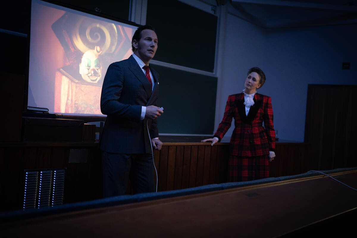 Patrick Wilson, left, as Ed Warren and Vera Farmiga as Lorraine Warren in "The Conjuring: ...