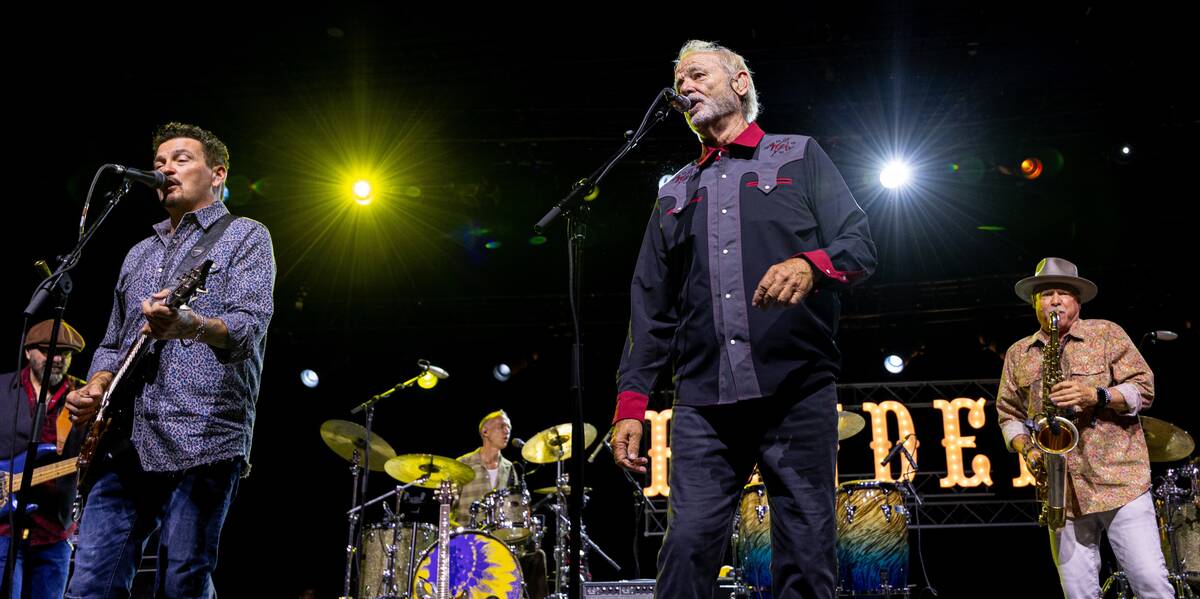 Bill Murray is shown with members of Blood Brothers Mike Zito, far left, and Jimmy Carpenter, f ...