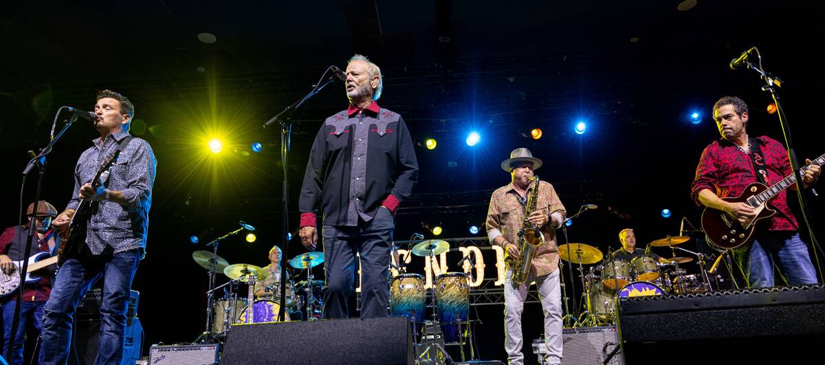 Bill Murray is shown with members of Blood Brothers, from left, Mike Zito, Jimmy Carpenter and ...