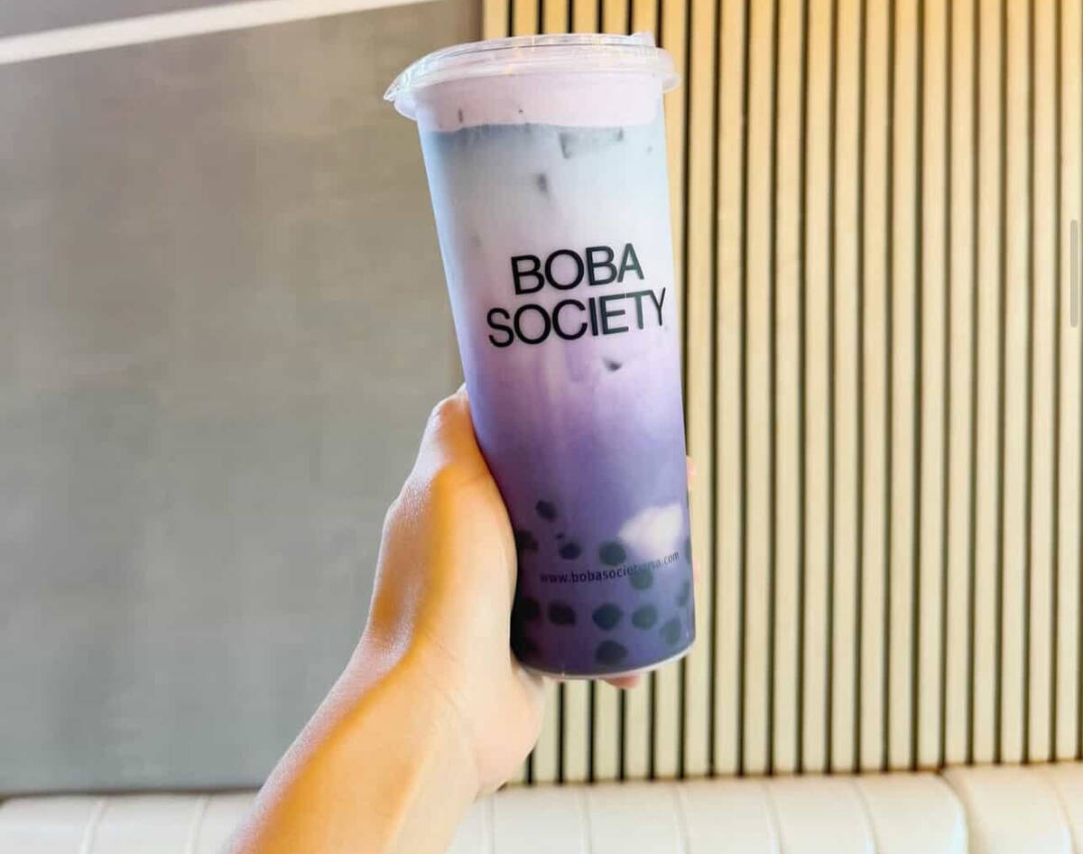 Taro Ocean is a taro latte with butterfly pea tea and milk, topped with ube taro foam. (Boba So ...